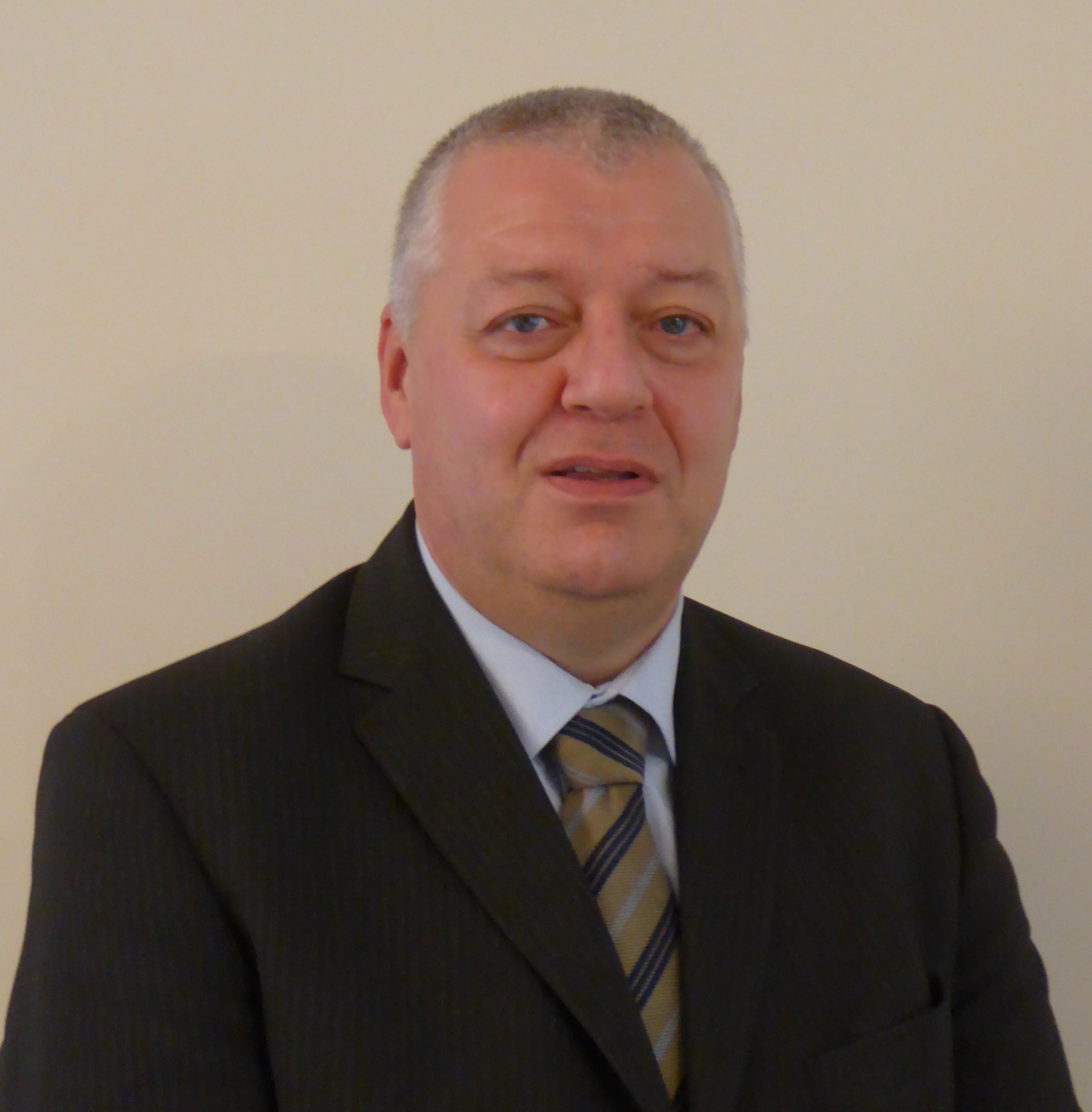 a man in a suit and tie