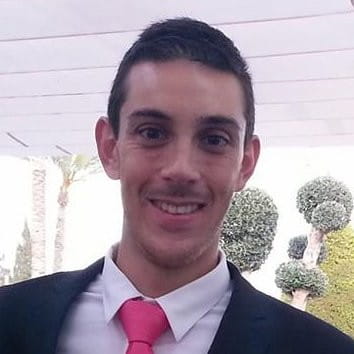 a young man in a suit and tie