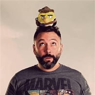 a man with an angry bird on his head