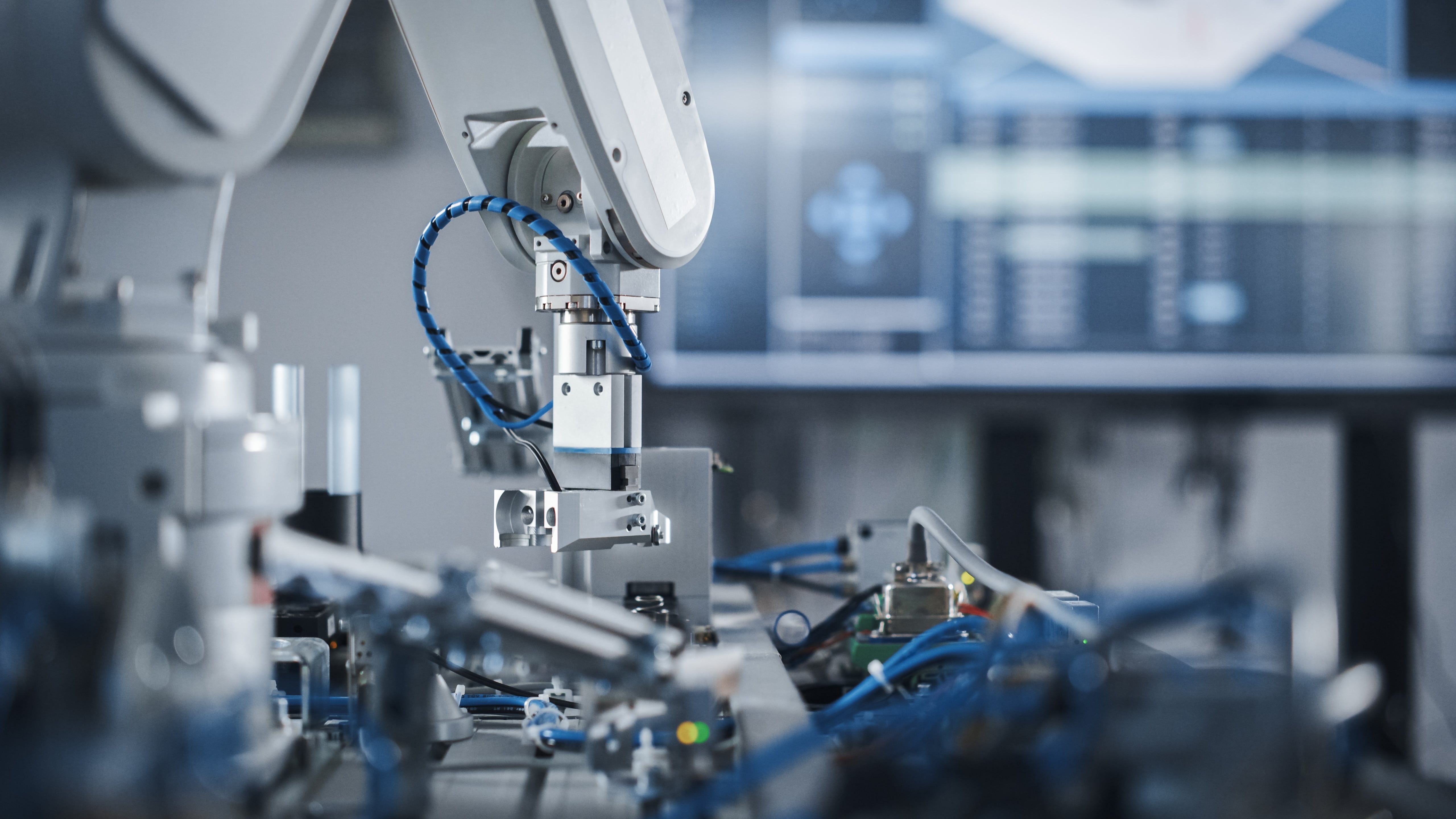 robotic arm working in a factory