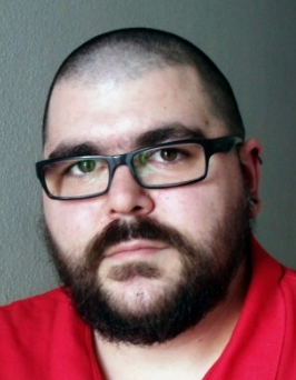 a man with glasses and a beard