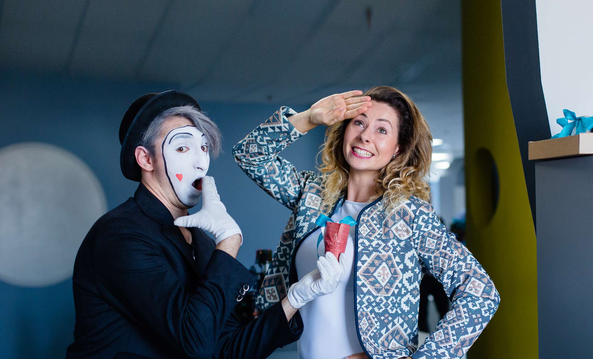 a woman with a clown face and a man with a clown face