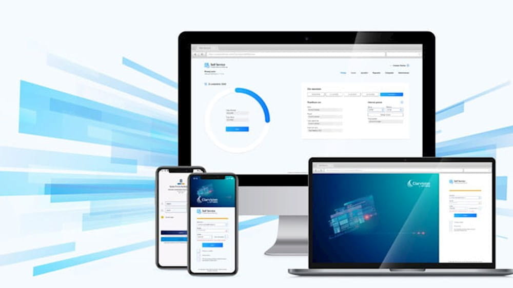 a laptop, tablet, and phone are displaying a website
