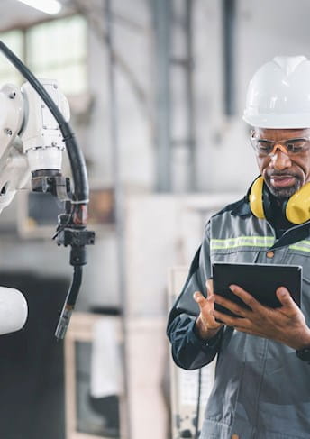 technician and mechanical arm