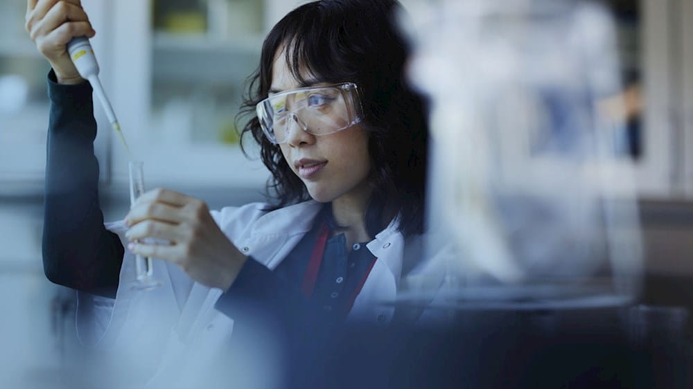 Technician working in pharma environment