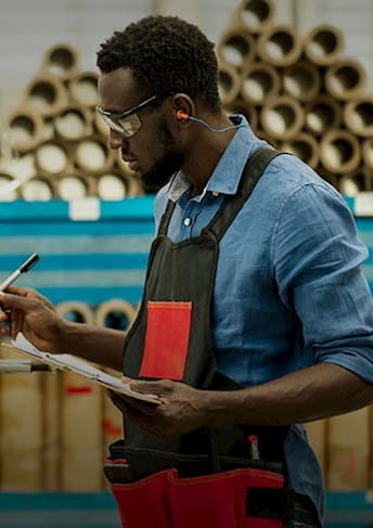 Man who goes inventory in a warehouse