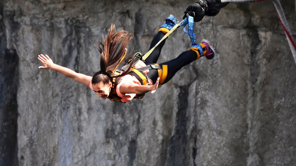 girl doing bungee jumping