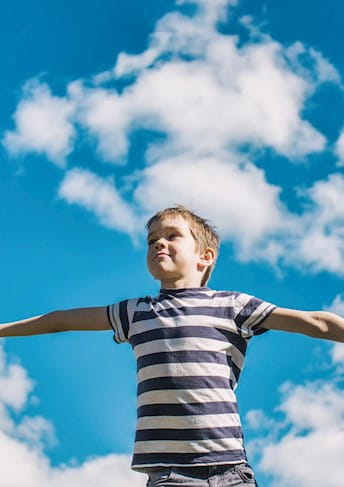 clouds above child