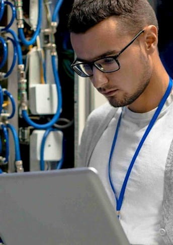 Man reading from a laptop