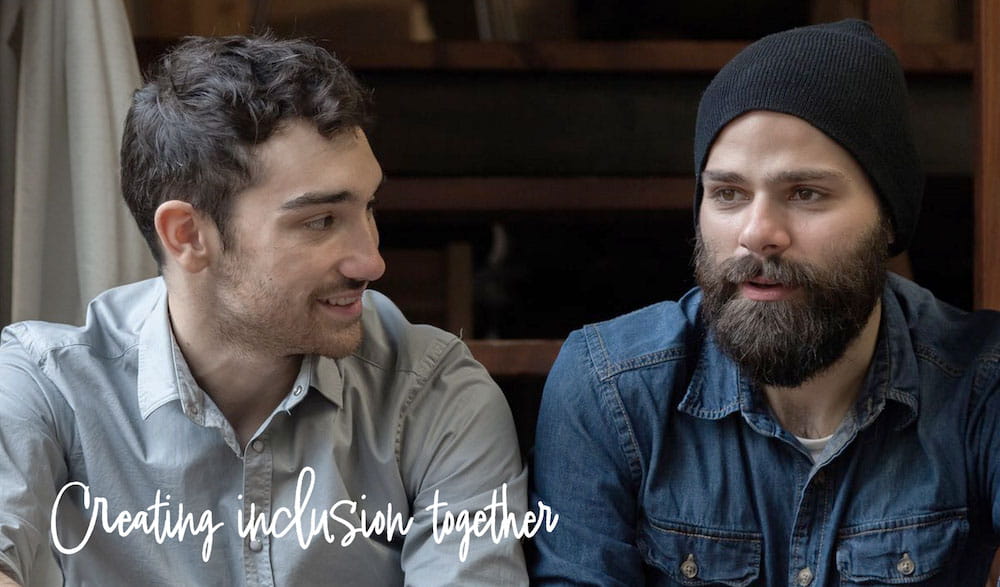 Creating Inclusion Together Campaign - Two men talking with each other