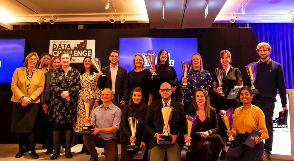 A group photo of the Civil Service Data Challenge winners