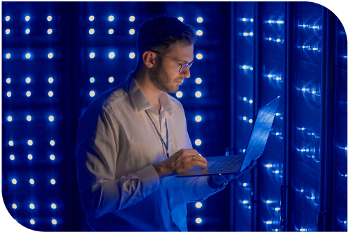 man reading from a laptop