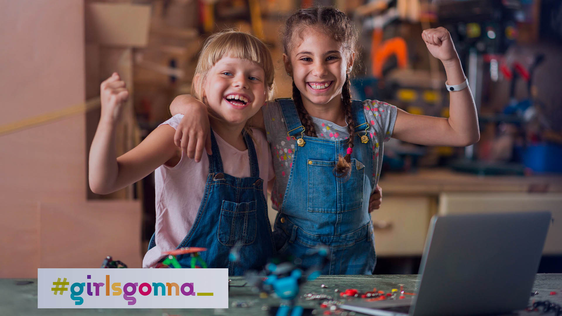 Diversity and inclusion - laughing children in front of laptop