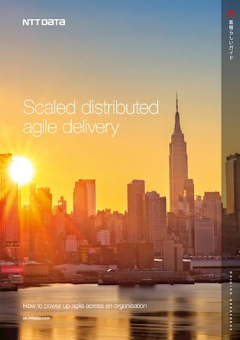 a cityscape with the words scaled distributed agile delivery
